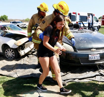 Lemoore High School and Every 15 Minutes, a lesson that keeps on teaching A victim, with a broke arm, is taken to an ambulance.